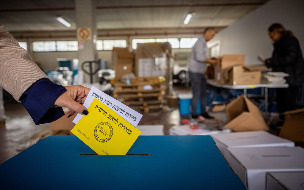 Ballot envelopes for the municipal elections in Jerusalem -- yellow for the mayor; white for the council -- pictured at a warehouse on February 22, 2024. (Yonatan Sindel/Flash90) Ballot envelopes for the municipal elections in Jerusalem -- yellow for the mayor; white for the council -- pictured at a warehouse on February 22, 2024. (Yonatan Sindel/Flash90)