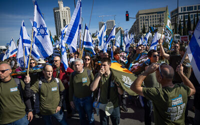 Protesters demanding ultra-Orthodox military conscription demonstrate outside the Supreme Court in Jerusalem, February 26, 2024. (Yonatan Sindel/Flash90)