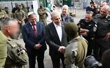National Security Minister Itamar Ben Gvir (left) and Prime Minister Benjamin Netanyahu meet with the troops who participated in a hostage rescue operation in Gaza, February 12, 2024. (Kobi Gideon/GPO)