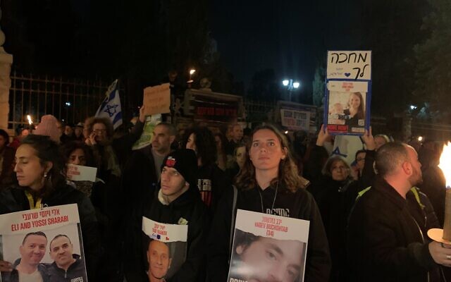 Demonstrators at Jerusalem rally hold signs with names and faces of Hamas-held hostages on February 24, 2024. (Charlie Summers/Times of Israel) Demonstrators at Jerusalem rally hold signs with names and faces of Hamas-held hostages on February 24, 2024. (Charlie Summers/Times of Israel)