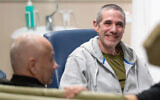 Louis Har (L) and Fernando Marman after their rescue, at Sheba Medical Center, February 12, 2024. (IDF Spokesperson)