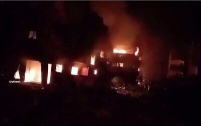 Palestinian homes allegedly torched by Israeli soldiers at Bureij refugee camp in central Gaza, January 29, 2024. (Screenshot/X; used in accordance with Clause 27a of the Copyright Law)