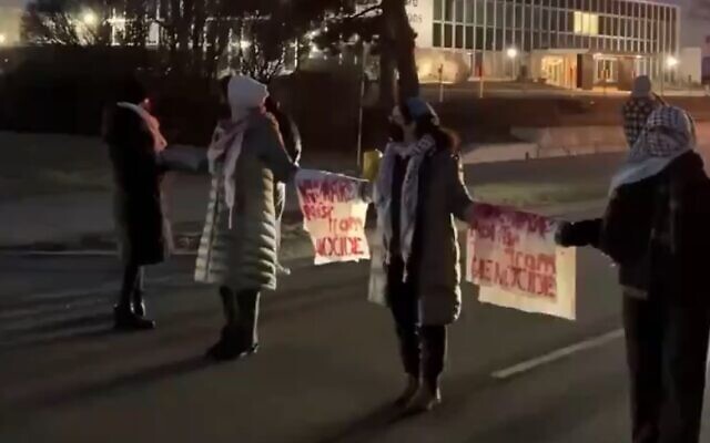 Pro-Palestinian demonstrators block the road outside Woodward MPC in Chicago on February 7, 2024. (Screen capture/X)