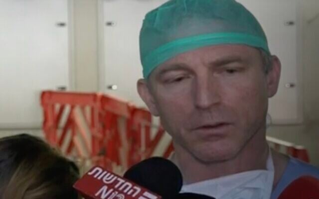 Dr. Alon Schwartz, head of the trauma department at Shaare Zedek Medical Center, speaks to the press after a terror shooting attack on Route 1 near Ma'ale Adumim, February 22, 2024. (Screenshot, used in accordance with Clause 27a of the Copyright Law) Dr. Alon Schwartz, head of the trauma department at Shaare Zedek Medical Center, speaks to the press after a terror shooting attack on Route 1 near Ma'ale Adumim, February 22, 2024. (Screenshot, used in accordance with Clause 27a of the Copyright Law)