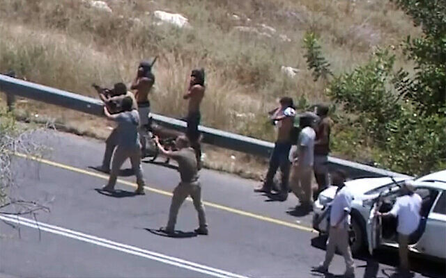 Illustrative: Screenshot from a video of settlers firing at the West Bank village of Umm Safa on June 24, 2023. (Twitter video screenshot: Used in accordance with Clause 27a of the Copyright Law) Illustrative: Screenshot from a video of settlers firing at the West Bank village of Umm Safa on June 24, 2023. (Twitter video screenshot: Used in accordance with Clause 27a of the Copyright Law)
