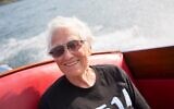 Ruth Fein, the first woman to chair Boston's Combined Jewish Philanthropies, enjoys a boat ride in Lake George, Massachuseets. (Michael Fein via JTA)