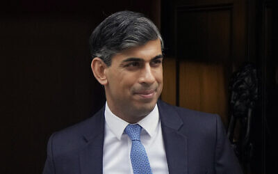 Britain's Prime Minister Rishi Sunak leaves 10 Downing Street to go to the House of Commons for his weekly Prime Minister's Questions in London, February 28, 2024. (Alastair Grant/AP)