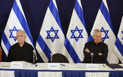 Prime Minister Benjamin Netanyahu and War Cabinet Minister Benny Gantz at a press conference in the Kirya military base in Tel Aviv, October 28, 2023. (Abir Sultan/ Pool Photo via AP)