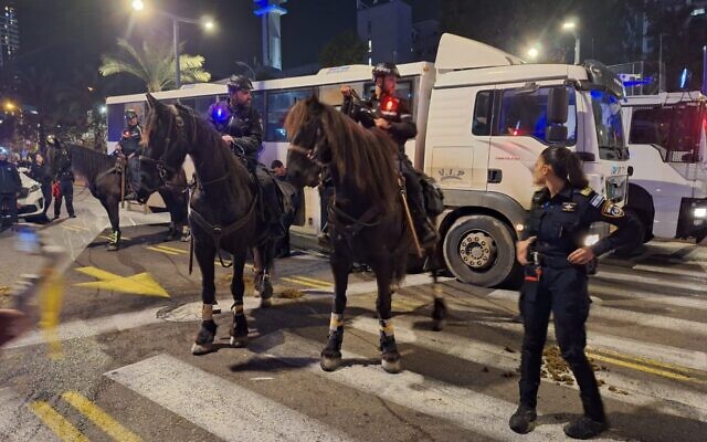Mounted police monitor the protest on Kaplan Street, February 24, 2024. (Benny Meshy / Israel Pro-Democracy Protest Movement) Mounted police monitor the protest on Kaplan Street, February 24, 2024. (Benny Meshy / Israel Pro-Democracy Protest Movement)