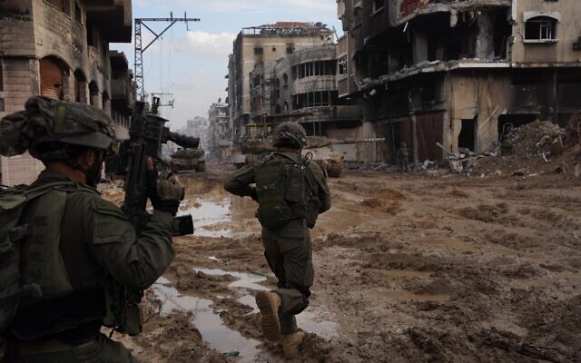 Reservists of the 5th Brigade operate in the northern Gaza Strip, in a handout image released by the IDF on February 3, 2024. (Israel Defense Forces) Reservists of the 5th Brigade operate in the northern Gaza Strip, in a handout image released by the IDF on February 3, 2024. (Israel Defense Forces)