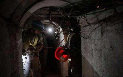 Troops of the Yahalom combat engineering unit rig a tunnel with explosives in southern Gaza's Khan Younis, in a handout image published February 21, 2024. (Israel Defense Forces)