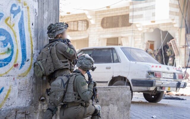 Troops of the Commando Brigade operate in southern Gaza's Khan Younis, in a handout image published by the IDF on February 15, 2024. (Israel Defense Forces) Troops of the Commando Brigade operate in southern Gaza's Khan Younis, in a handout image published by the IDF on February 15, 2024. (Israel Defense Forces)
