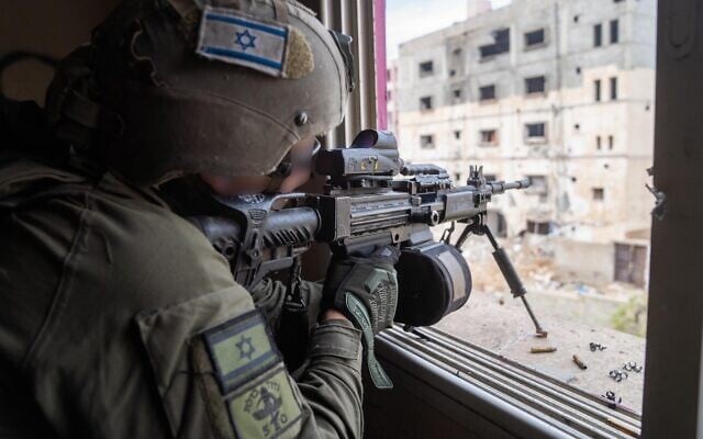 Troops operate in central Gaza's Shati Camp, in an image released by the IDF on February 15, 2024. (Israel Defense Forces)