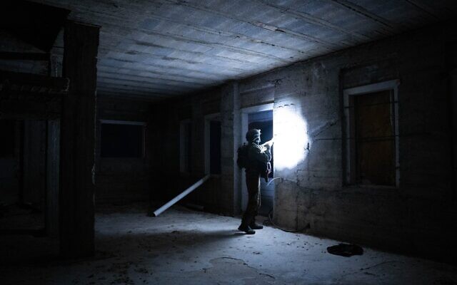 IDF troops measure the home of a Palestinian terrorist in the West Bank town of Za'atara, east of Bethlehem, early February 24, 2024. (Israel Defense Forces)