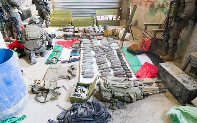 Weapons captured by the Maglan unit in southern Gaza's Khan Younis, in a handout image published by the IDF on February 27, 2024. (Israel Defense Forces)