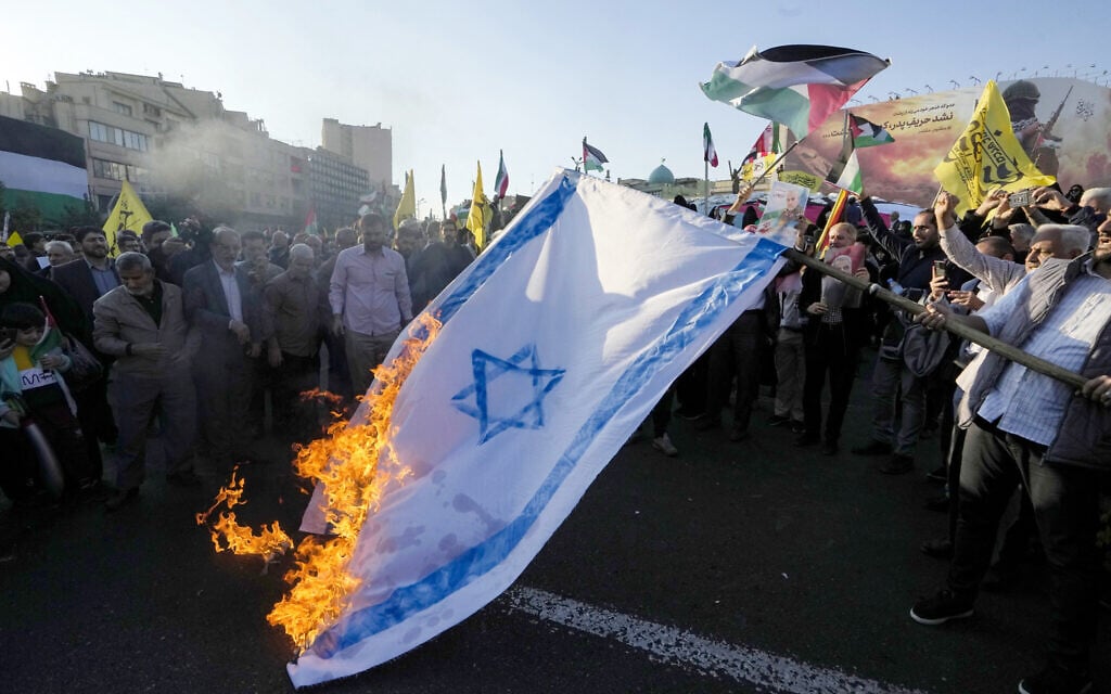 Iranians burn an Israeli flag during a protest in Tehran in support of Palestinians in Gaza on November 18, 2023 (Photo by AFP) Iranians burn an Israeli flag during a protest in Tehran in support of Palestinians in Gaza on November 18, 2023 (Photo by AFP)