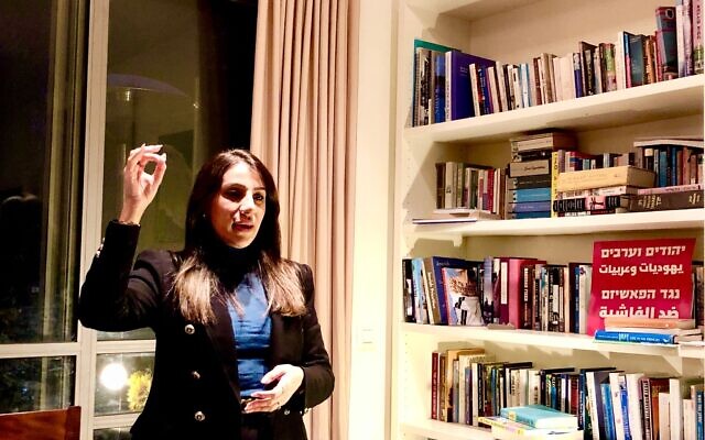 Sondos Alhoot, head of the Kol Toshaveha list, running for Jerusalem city council in the 2024 municipal elections, in a meeting with voters, February 19, 2024 (Ittay Flescher, courtesy)