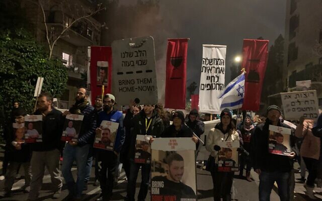 Protesters demanding a hostage deal march down Jerusalem's Azza Street to the prime minister's official residence on February 17, 2024. (Charlie Summers/Times of Israel) Protesters demanding a hostage deal march down Jerusalem's Azza Street to the prime minister's official residence on February 17, 2024. (Charlie Summers/Times of Israel)
