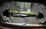 A Matador shoulder-mounted launcher and boxed ammo rounds in a trunk, in a photo released by police on February 18, 2024. (Israel Police)