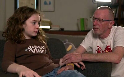 Screen capture from video of Thomas Hand and his daughter, released Hamas hostage Emily. (Screenshot/Channel 12; Used in accordance with Clause 27a of the Copyright Law)
