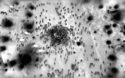 Aerial footage showing crowds rushing aid trucks in northern Gaza, released on February 29, 2024. (Israel Defense Forces)