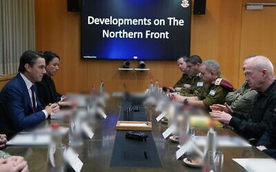 Defense Minister Yoav Gallant (R) and military officials meet with US envoy Amos Hochstein (L) in Tel Aviv, February 4, 2024. (Defense Ministry)