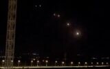 A screenshot of video showing Iron Dome interceptors being launched after the Lebanese terror group Hezbollah fired a barrage of rockets at northern Israel, March 4, 2024. (X screenshot, used in accordance with Clause 27a of the Copyright Law)