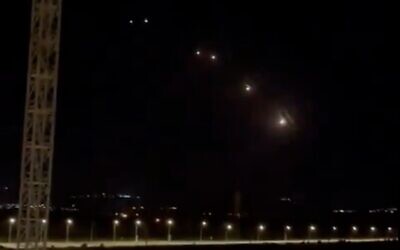 A screenshot of video showing Iron Dome interceptors being launched after the Lebanese terror group Hezbollah fired a barrage of rockets at northern Israel, March 4, 2024. (X screenshot, used in accordance with Clause 27a of the Copyright Law)