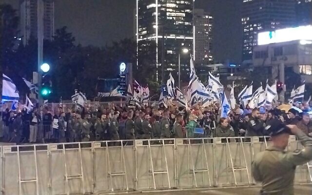 Protesters gather next to police barricades near the Kirya in Tel Aviv on March 2, 2024. (Iddo Schejter/Times of Israel) Protesters gather next to police barricades near the Kirya in Tel Aviv on March 2, 2024. (Iddo Schejter/Times of Israel)