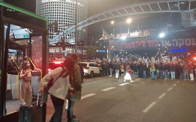 Protesters march on Begin Street in Tel Aviv on March 9, 2024. (Iddo Schejter / Times of Israel) Protesters march on Begin Street in Tel Aviv on March 9, 2024. (Iddo Schejter / Times of Israel)