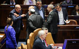 Hadash-Ta’al chairman Ahmad Tibi argues with National Security Minister Itamar Ben Gvir during a vote on the amended 2024 budget, March 13, 2024. (Noam Moskowitz, Office of the Knesset Spokesperson)