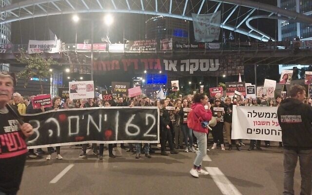 Protesters at hostage deal rally block the north section of Begin Street in Tel Aviv, March 16, 2024. (Iddo Schejter/Times of Israel)