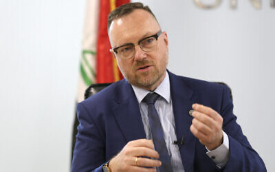 Head of the United Nations Investigative Team to promote Accountability for Crimes Committed by Daesh/ISIL (UNITAD) Christian Ritscher, speaks during an interview at his offices in the green zone of Iraq's capital Baghdad on November 14, 2022. (Sabah ARAR / AFP)