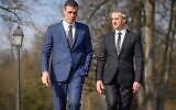 File: Spanish Prime Minister Pedro Sanchez (L) speaks with his Slovenian counterpart Robert Golob after a press conference following their meeting at the Brdo Castle, on February 17, 2023. (Jure Makovec/AFP)