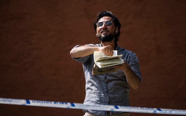 Salwan Momika protests outside a mosque in Stockholm on June 28, 2023. (Jonathan NACKSTRAND / AFP)