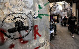 The logo of the Palestinian Islamic Jihad movement at the Shatila camp for Palestinian refugees in a southern suburb of Beirut on November 7, 2023. (Photo by AHMAD AL-RUBAYE / AFP)