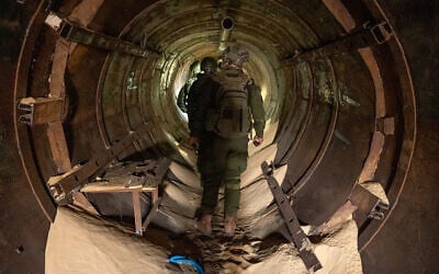 Israeli troops in an underground Hamas tunnel in Gaza, February 4, 2024. (Israel Defense Forces/AFP)