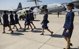 File - Chilean air force female personnel walk by  a US Boeing C-17 Globemaster military transport aircraft  during the XIX Air and Space Fair (FIDAE) in Santiago  on March 29, 2016. (Martin Bernetti/AFP)
