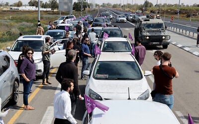 A convoy of 30 vehicles driven by Israeli activists from the 'Standing Together' movement, gather in the southern Israeli city of Ashkelon near the border with the Gaza Strip on March 7, 2024, in a show of support for Palestinians. (Jack Guez/AFP)