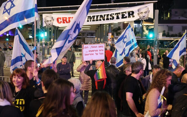 Activists attend an anti-government demonstration in Tel Aviv on March 9, 2024. (Photo by JACK GUEZ / AFP) Activists attend an anti-government demonstration in Tel Aviv on March 9, 2024. (Photo by JACK GUEZ / AFP)