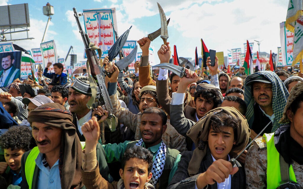 Supporters of Yemen's Iran-backed Houthis march in the capital Sana'a on March 15, 2024, in support of Palestinians, during the Israel-Hamas war in the Gaza Strip. (Mohammed Huwais/ AFP)