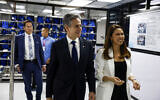 US Secretary of State Antony Blinken (2nd R) and Roveluz Reyes, director of Engineering at Amkor Technology, during a tour of Amkor Technology in Manila on March 19, 2024. (EVELYN HOCKSTEIN / POOL / AFP)