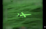 Illustrative: This handout grab of a video taken and released on March 20, 2024, shows a Houthi UAV threatening commercial navigation (Etat-Major des Armees / AFP)