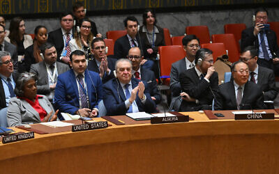 (From left) US Ambassador to the United Nations Linda Thomas-Greenfield, Algeria's Ambassador to the UN Amar Bendjama and Chinese Ambassador to the UN Zhang Jun applaud during a United Nations Security Council meeting demanding an immediate ceasefire in Gaza, at the UN headquarters in New York on March 25, 2024. (Angela Weiss/AFP) (From left) US Ambassador to the United Nations Linda Thomas-Greenfield, Algeria's Ambassador to the UN Amar Bendjama and Chinese Ambassador to the UN Zhang Jun applaud during a United Nations Security Council meeting demanding an immediate ceasefire in Gaza, at the UN headquarters in New York on March 25, 2024. (Angela Weiss/AFP)