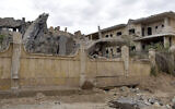 This picture taken on March 26, 2024, shows a view of a damaged building following an airstrike in Syria's eastern city of Deir Ezzor. (AFP)