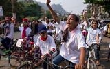 Young women rally against child marriage, dowry, and domestic violence in a protest organized by AJWS grantee Masum Foundation in Mavadi, India, March 31, 2015. (Jonathan Torgovnik/AJWS via JTA)