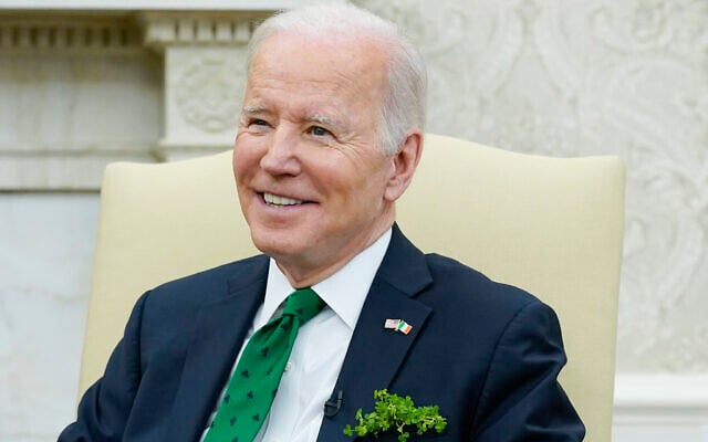 President Joe Biden meets virtually with Irish Prime Minister Micheál Martin in the Oval Office of the White House, Thursday, March 17, 2022 (AP Photo/Patrick Semansky)