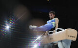 Israel's Pavel Gulidov competes on the pommel horse during the men's all-round final at the Artistic Gymnastics World Championships in Antwerp, Belgium, October 5, 2023. (AP Photo/ Geert vanden Wijngaert/ File)