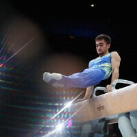 Israel's Pavel Gulidov competes on the pommel horse during the men's all-round final at the Artistic Gymnastics World Championships in Antwerp, Belgium, October 5, 2023. (AP Photo/ Geert vanden Wijngaert/ File)