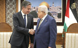 US Secretary of State Antony Blinken, left, and Palestinian Authority President Mahmoud Abbas shake hands during their meeting in the West Bank town of Ramallah, February 7, 2024. (AP Photo/ Mark Schiefelbein, Pool)